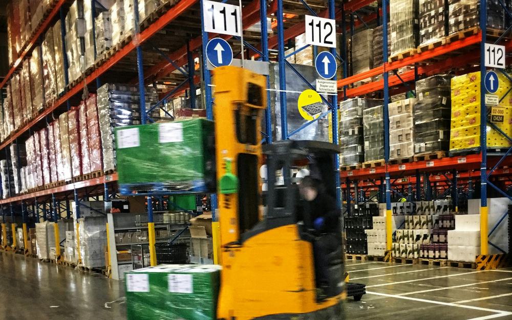 Busy warehouse environment where hearing protection is required